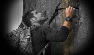 man climbing wall