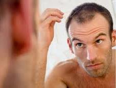 man in front of mirror 